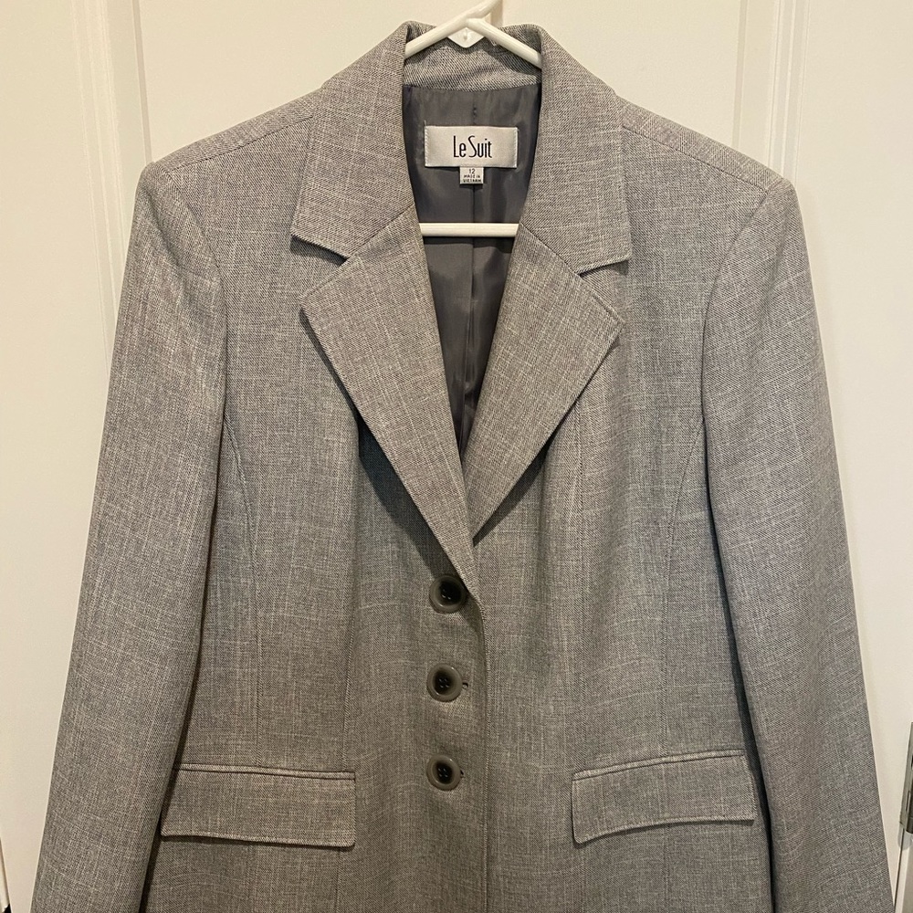 Beautiful Ladies Blazer. Size 12. Light Gray. Worn Once. Arm length 32 inches.
